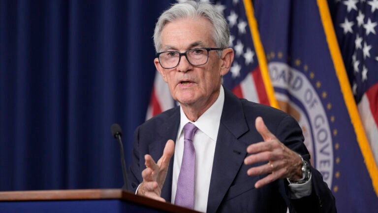 Federal Reserve cuts key rate by sizable half-point, signaling end to its inflation fight